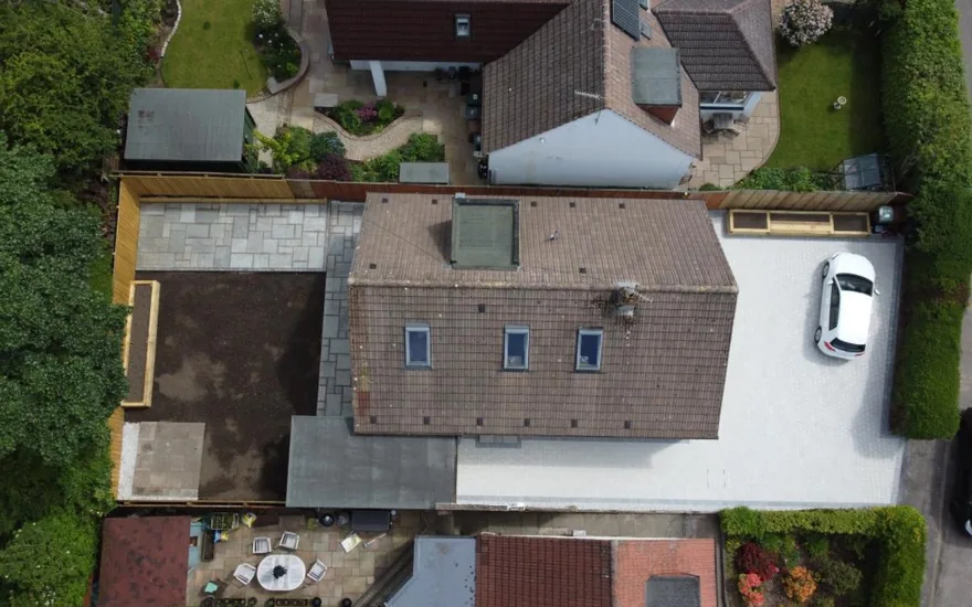 Aerial drone view of a finished block-paved driveway and home — Hallmark Driveways